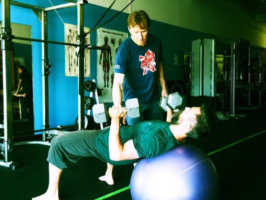 Swiss ball chest press.