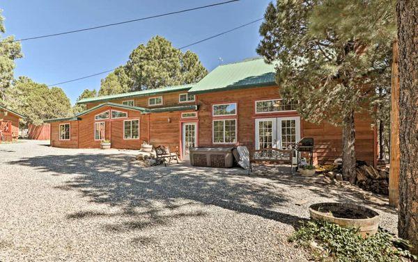 The Big Bear Lodge with 6 bedrooms, 6 bathrooms and 5 decks. Rent the whole thing or by the room.