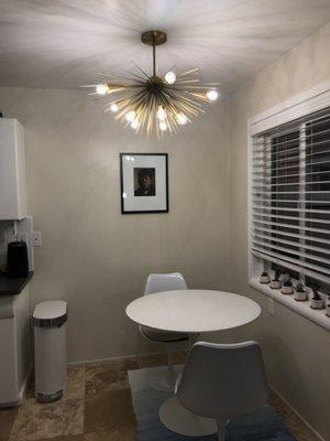 Dining area 2.0. Ted allowed me to have an electrician install all new light fixtures.