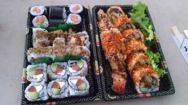 Lobster roll on right.. Philly salmon and shrimp tempura on left