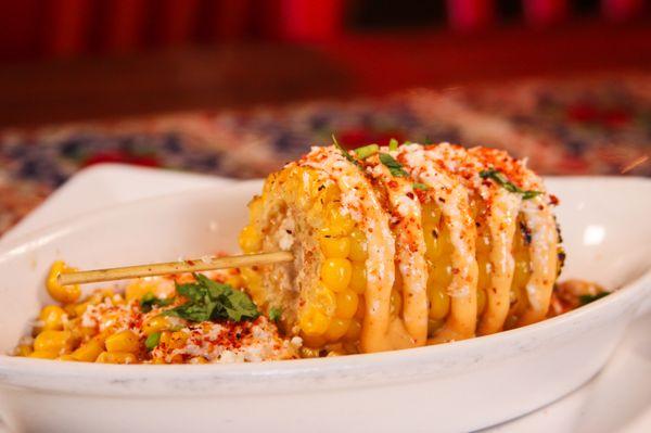 It's CORN! A big lump with knobs! It has the JUICE! I can't imagine a more beautiful thing!
Try our delicious Esquite!
