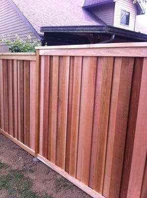 Overlap picture frame style in clear cedar with stainless steel screws.