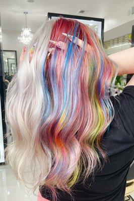Blonde hair with colorful highlights
