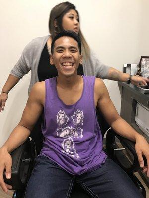 Here's some photos of him at the barbershop! Looking like a happy camper!!