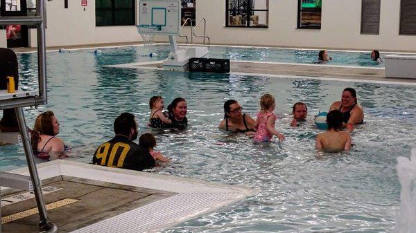 a broad view of the pool area (minus the playground. The back is the deeper end for bigger kids and grown ups.