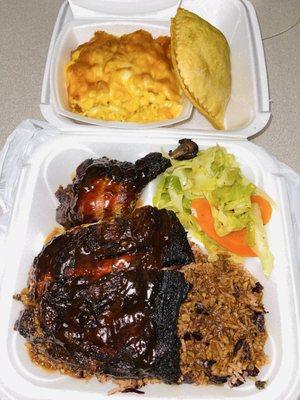 Jerk Chicken, Rice And Peas, Cabbage, Mac&Cheese and Chicken Patty.