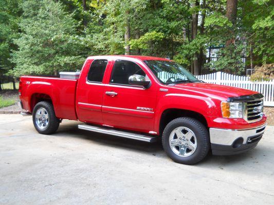 Dent above door handle.
Completely gone after work done.