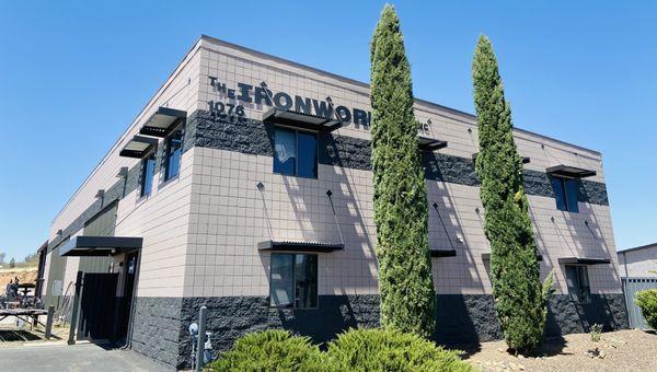 Outside. Entrance on the left.