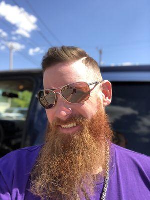 Hard part cut in by hand with a straight razor. Very straight and very skillfully done.