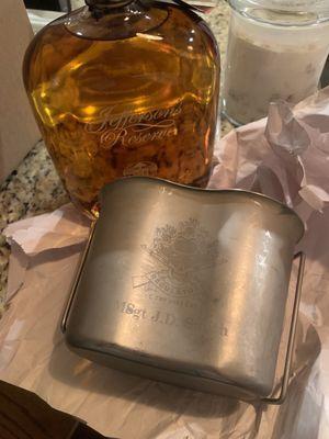 Stainless steel Army issued canteen cup engraved as gifts for distinguished guests.