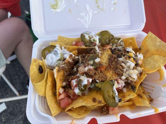 Chorizo is a nice change from other typical nacho proteins. Get napkins and plan for messiness!!