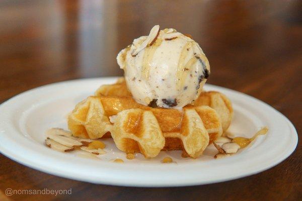 Mini Waffle Sundae with Cookies and Cream Ice Cream and topped with honey and sliced almonds