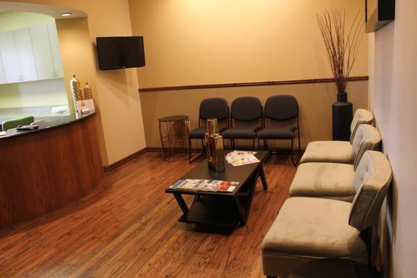 Our warm waiting room which includes a separate play room.