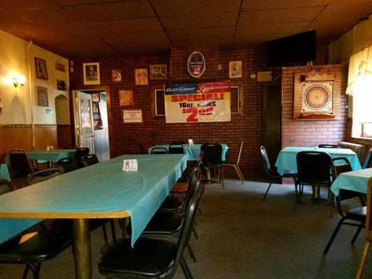 Dining area menu and kicked up wings.