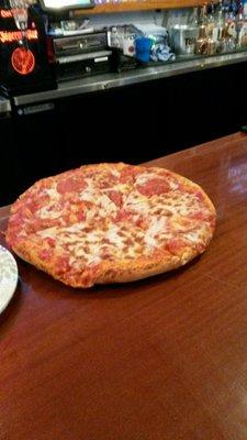 A half cheese and half pepperoni pizza I bought for my Meetup Group at Splash Bar.