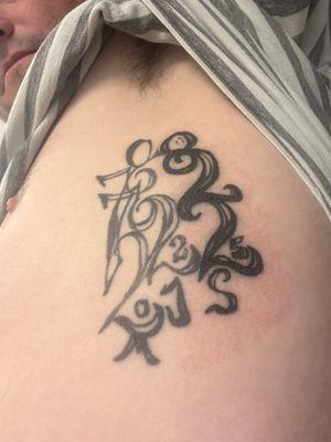 Finished product that looks nothing like the stencil. Carl filled the whole thing in with no grace to match my existing tattoo.