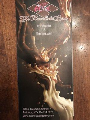 Front of menu with store info