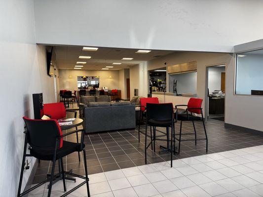 Service waiting area. With couches, workstations, and tv while you wait!