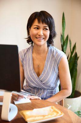 Reviewing patient intake during a consultation for an Initial Healing session.