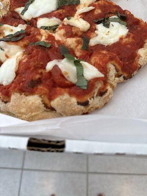 Margherita Flatbread. The homemade crust takes it to the next level.