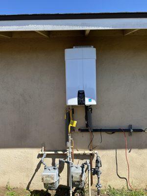 Install new thank less water heater