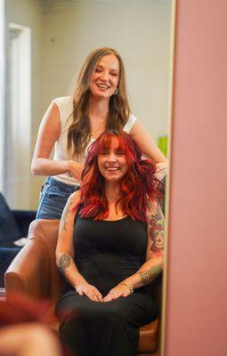 Owner Amanda styles her vivid client.