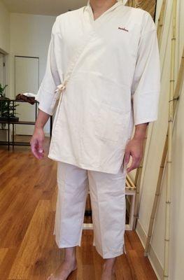 2-piece Japanese Relaken top and bottom that you get to wear when you come in for hot stone time. Feels like you're at a spa.