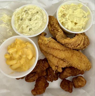 Fried Catfish Platter with fried Gator and three sides, potato salad, Mac and cheese, and coleslaw . All homemade