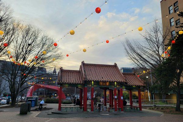 Newly hung red and gold globes string lights