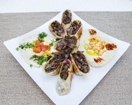 Kingdom Shawarma Plate (Beef), 14" Wrap cut into 8 pieces served with 2 sides of choice and 1 large or 2 small drinks. Good for sharing :)