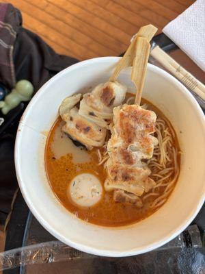 Signature tonkotsu ramen, carnivore style with chicken yakitori