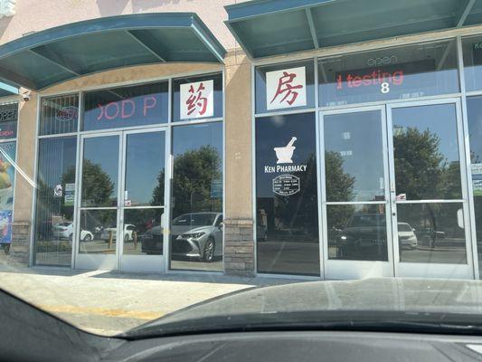 Front doors of Ken Pharmacy.