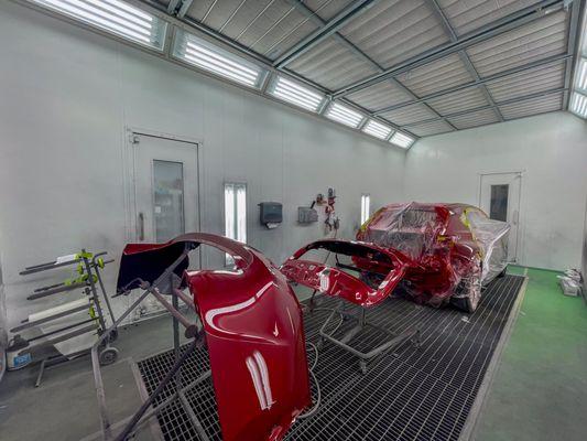 Color application underway in our state-of-the-art paint booth.