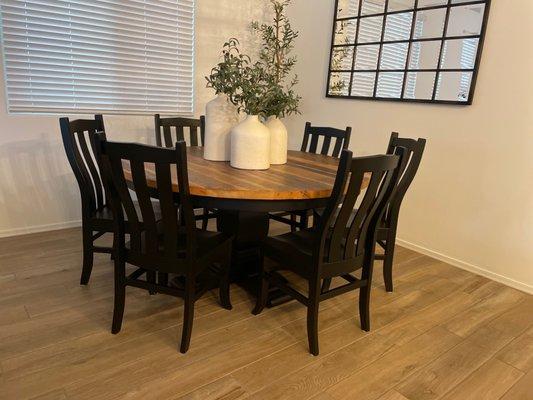 My custom-made 70-imch round dining table and chairs.