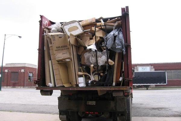 WE PULLLED 36-40 CUBIC YARD TRUCKS OF DEBRIS OUT OF THE FORMER ARONSON FURNITURE WAREHOUSE IN 7 DAYS!