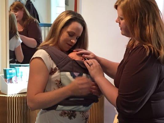 Carrier fitting for a newborn.