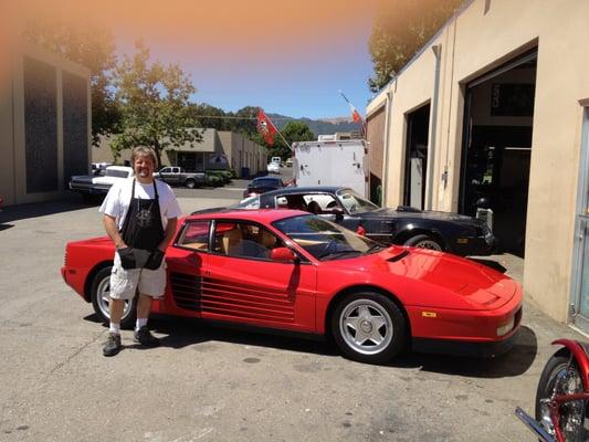 Jim and his Testarossa. You can trust a guy able to keep one of THOSE on the road to keep YOUR car on the road!
