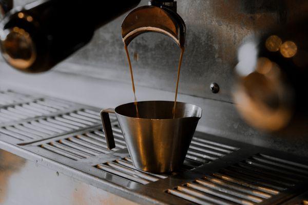 Shot of espresso pulling.