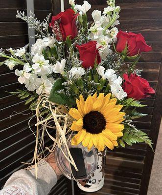 Sunflower and roses in a Swig