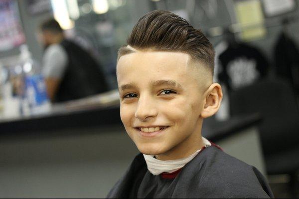 We love to see our young ones satisfied with the ending results, after a great quality, cleaned cut.