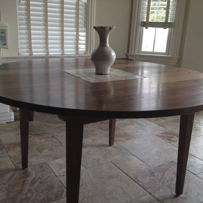 Walnut dining table with handmade ceramic tile inlaid into the top. 55" dia.