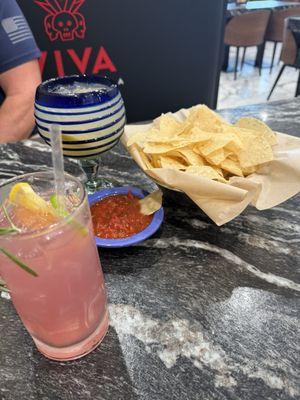 Pomegranate, rosemary infused margarita and House margarita, delicious, amazing salsa, and fresh chips