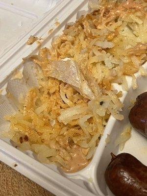 Donttttt eat herre there's a price of fried plastic in my Home Fries They need to get inspected