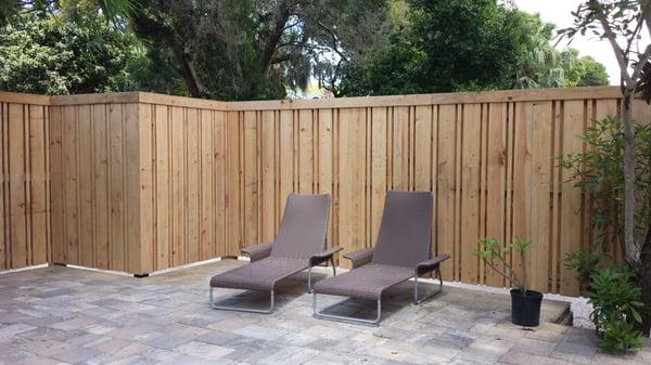 Custom Alternating Sized Boards Vertical Shadow Box Fencing with Top Boarder.