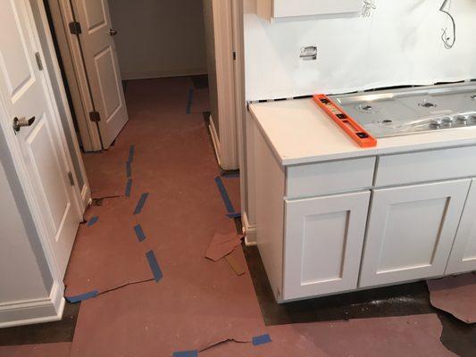 Home almost ready! Total home rehab. New wood floors, new doors throughout the home, new kitchen.