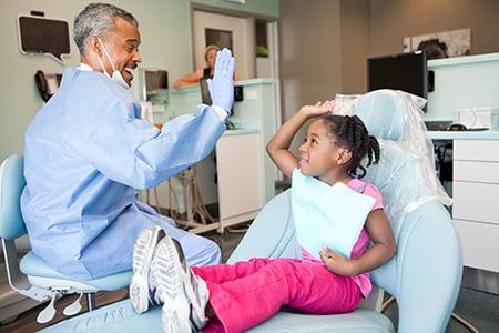 Dr. Mangram is known for his high-fives! You can't help but have fun.