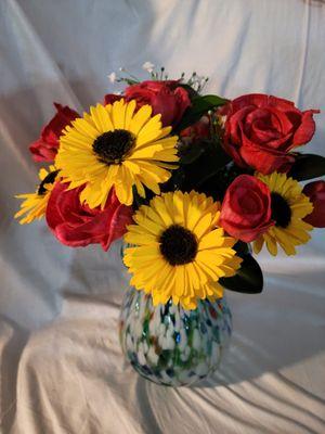Sunflowers and roses