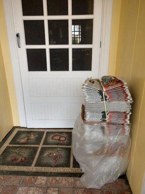 View of the stack after I moved it to the side so I could open my screen door from the inside.