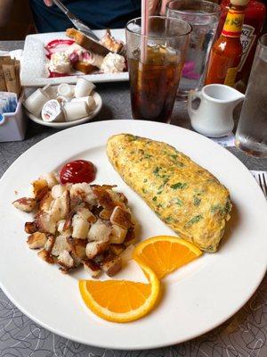 Winnie Omelette bacon, grilled leeks, baby spinach and sonoma goat cheese