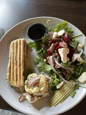 Shared beet salad and turkey, Brie, and fig jam panini.